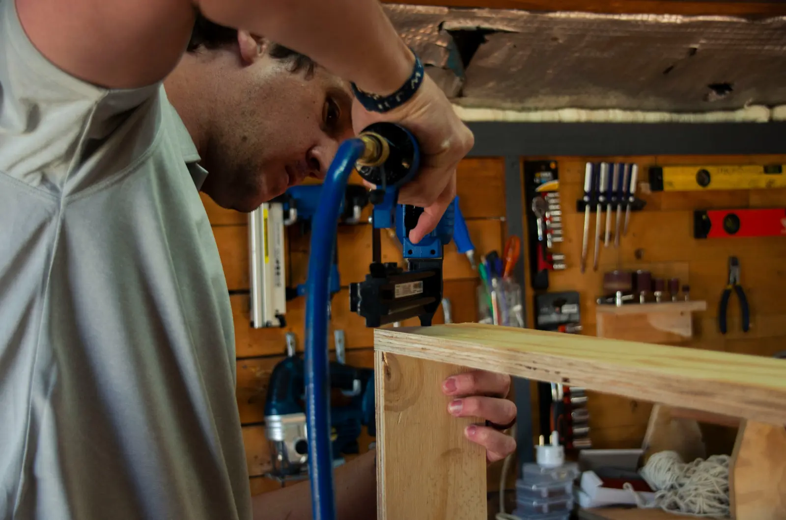Carpenter assembling custom woodwork in our workshop